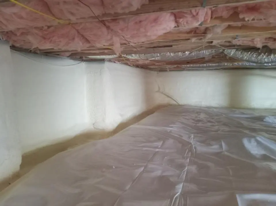 Crawl space encapsulation with closed-cell spray foam for Commercial Roof Restoration in Compton
